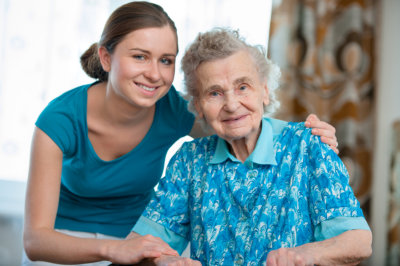 woman and an elder woman smiling
